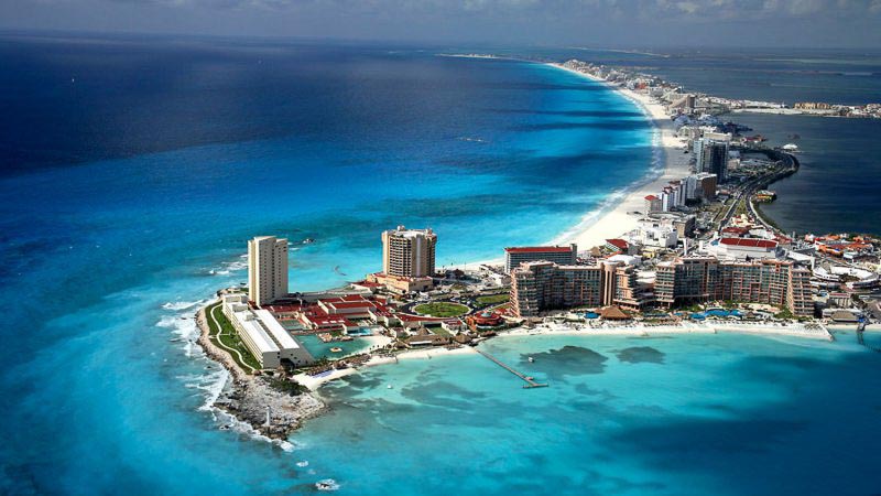 Cancun, Mexico drone view. The dental implant & all-on-4 cost in Mexico, specifically Cancun, is great