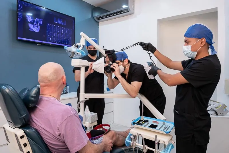 The doctors are taking photos of an All on 4 patient in Mexico.