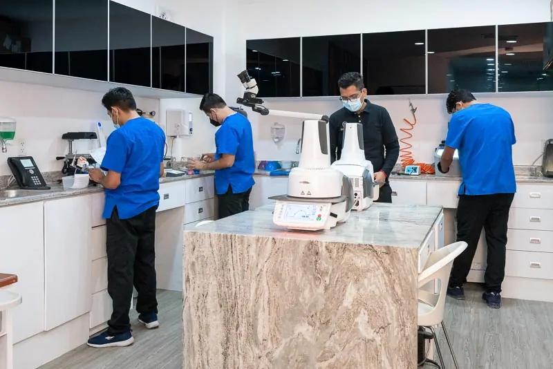 Lab technicias are working on dental implants and crowns in Mexico.